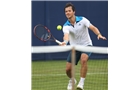 EASTBOURNE, ENGLAND - JUNE 14: James Marsalek of Great Britain plays a forehand against Divij Shran of India during their Men's Singles first round qualifying match on day one of the Aegon International at Devonshire Park on June 14, 2014 in Eastbourne, England.  (Photo by Steve Bardens/Getty Images)